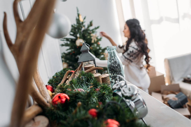 woman decorating christmas tree - Photo, Image