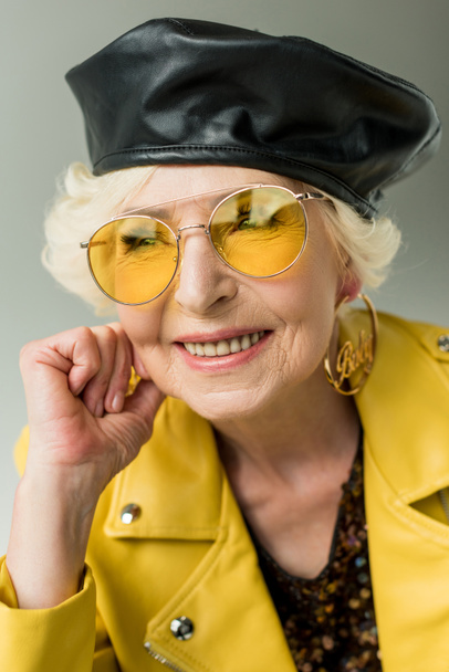 senior lady in yellow sunglasses - Valokuva, kuva