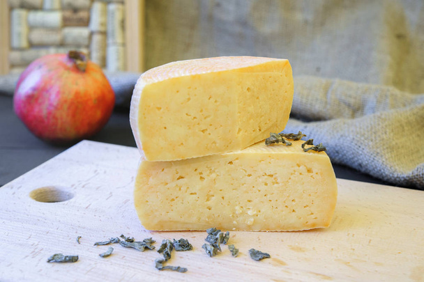 Homemade Caciotta cheese on wooden board rural style - Foto, immagini