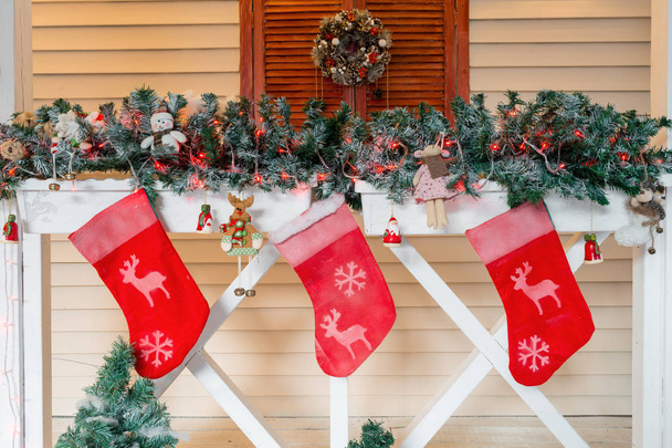Christmas sock and decoration on wood. - Photo, Image