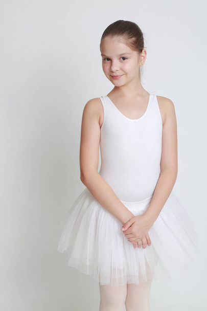 Beautiful little ballerina in studio - Photo, Image