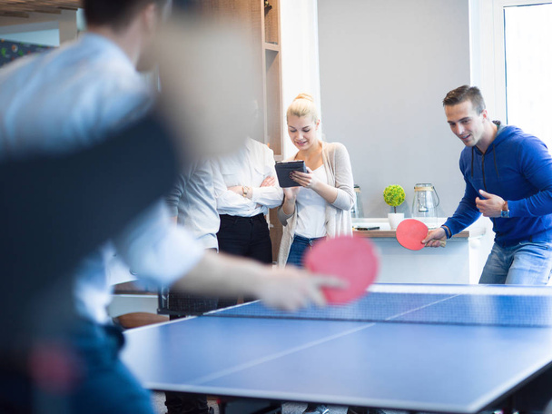 startup business team playing ping pong tennis - Foto, Imagen