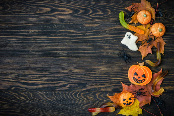 Halloween background with cookies and candy - 写真・画像