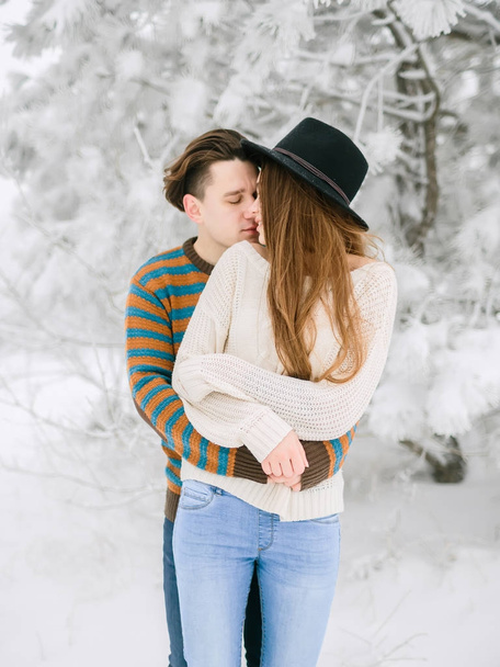 Young couple hugging in forest - Photo, Image