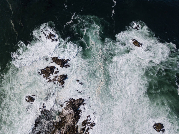 Aerial View of Ocean and Rocky Seashore in California - Fotó, kép