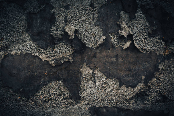 Black wall background. Grunge texture with stone and old iron parts - Foto, imagen
