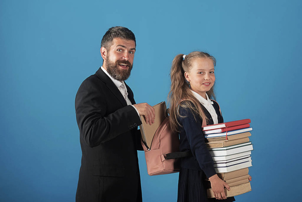 Education and back to school concept. Kid holds books - Φωτογραφία, εικόνα