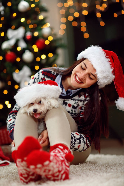 young girl holding a Christmas present puppy dog - Photo, Image