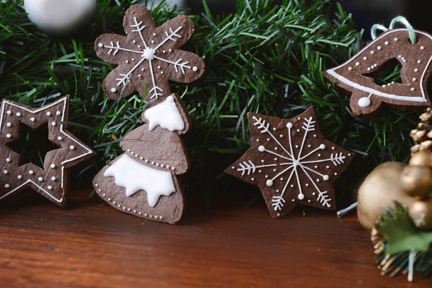 Close up view of Christmas cookies with festive branches fir - Φωτογραφία, εικόνα
