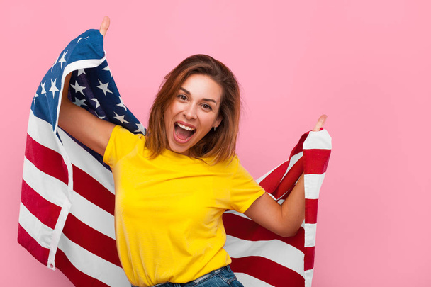 Charming model posing happily with flag - Foto, Bild