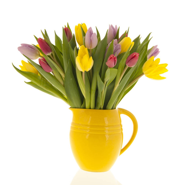Mixed bouquet tulips in vase - Fotoğraf, Görsel