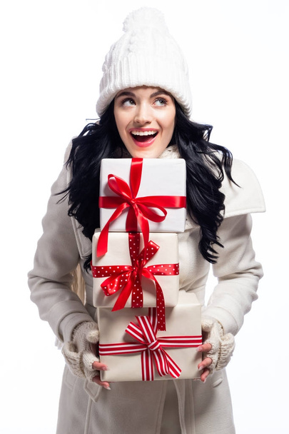 Young woman holding Christmas gifts - Valokuva, kuva