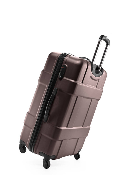 brown suitcase plastic on two wheels - Valokuva, kuva