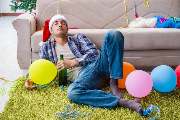Man having hangover after christmas party - Photo, Image