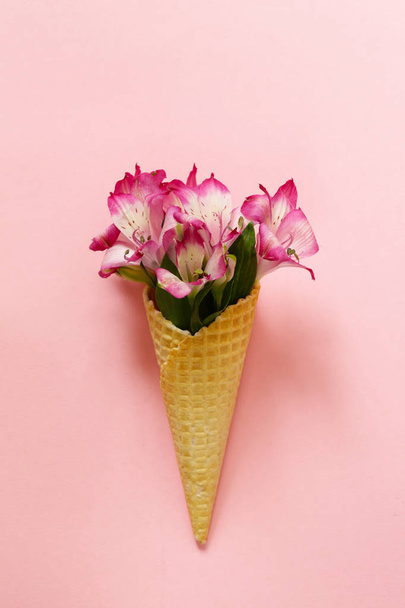 bouquet of pink flowers in waffle cone - Photo, Image