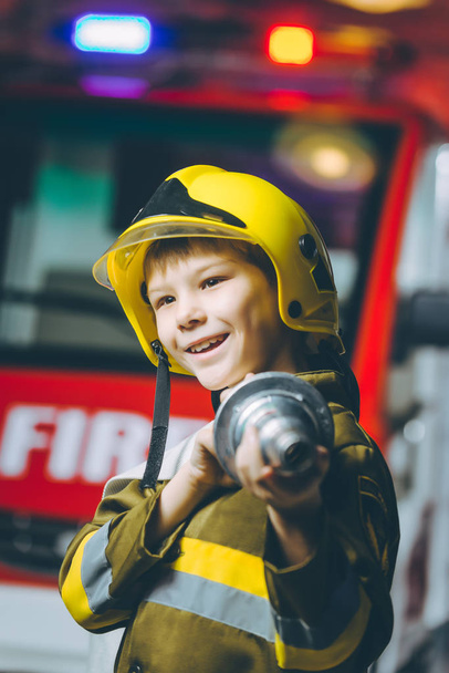 Child Firefighter play - 写真・画像