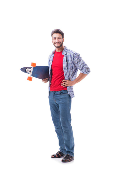 Young skateboarder with a longboard skateboard isolated on white - Fotó, kép