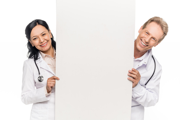 lékaři drží prázdný nápis - Fotografie, Obrázek