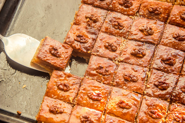 Baklava with nuts and honey. Selective focus. - Photo, Image