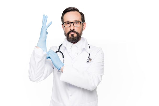 doctor wearing medical gloves - Photo, image