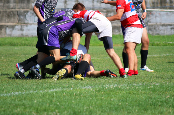 Les joueurs de rugby jouent le jeu
 - Photo, image