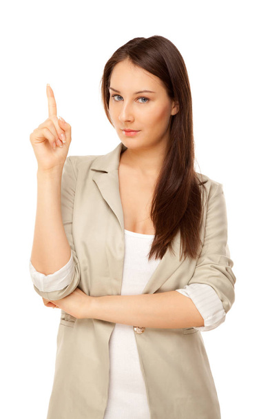 Businesswoman pointing her finger up isolated on white - Фото, зображення