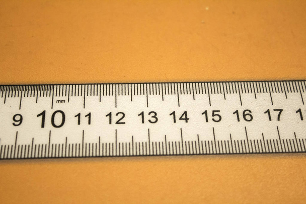 Dettaglio del nastro di misura da misurare
 - Foto, immagini