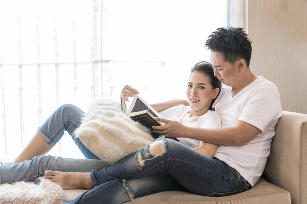 Asian Couple with book - 写真・画像