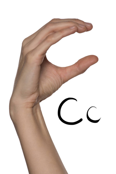 Alfabeto para personas sordo-mudas con gestos de mano y una letra numérica sobre un fondo
 - Foto, imagen