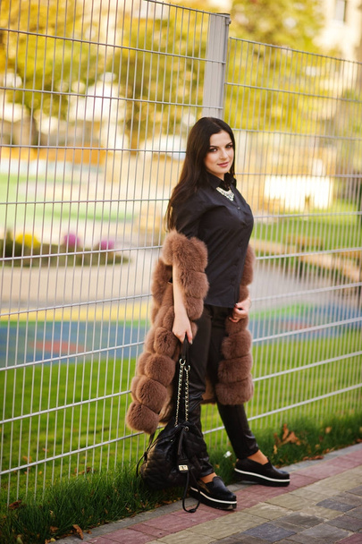 Fashion outdoor photo of gorgeous sensual woman with dark hair i - Foto, immagini