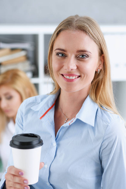 Smiling business woman drinking coffee - Photo, Image