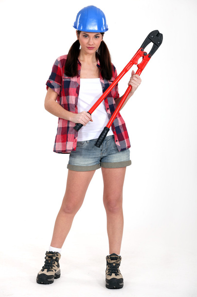 Attractive brunette with bolt-cutters - Foto, afbeelding