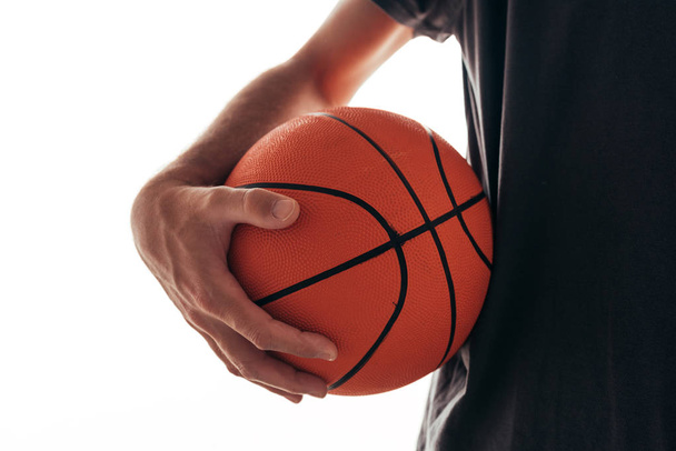 Basketball training, man holding ball - 写真・画像