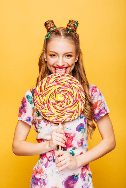 woman with lollypop candy - Foto, Imagen