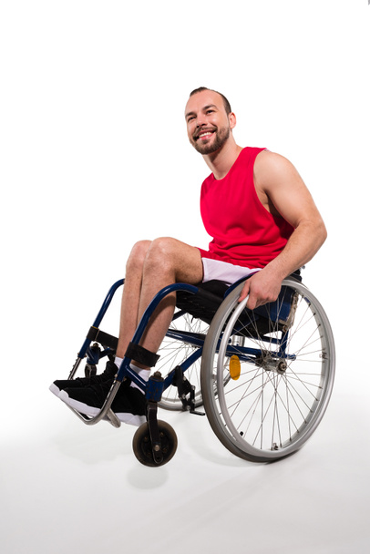 Smiling sportsman in wheelchair  - Photo, Image