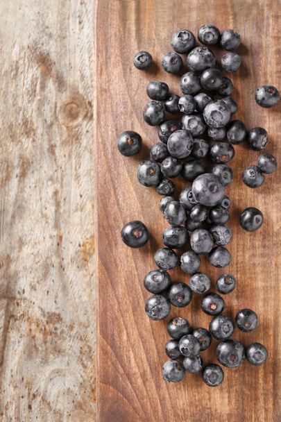 Fresh acai berries on wooden background - Фото, зображення