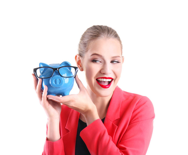 young woman with piggy bank - Foto, afbeelding