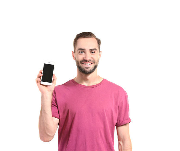 Attractive young man with smartphone  - Фото, изображение