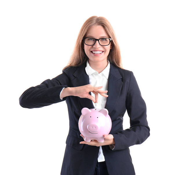young woman with piggy bank - Fotó, kép