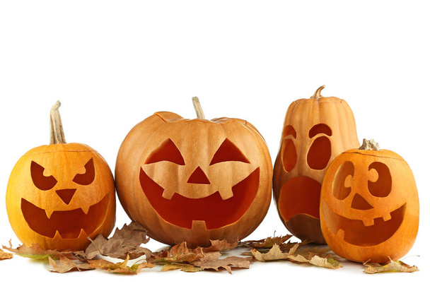 Halloween pumpkins with dry leaves - Photo, image