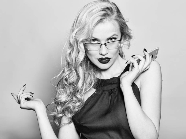 Sexy blonde in glasses with phone - Fotografie, Obrázek