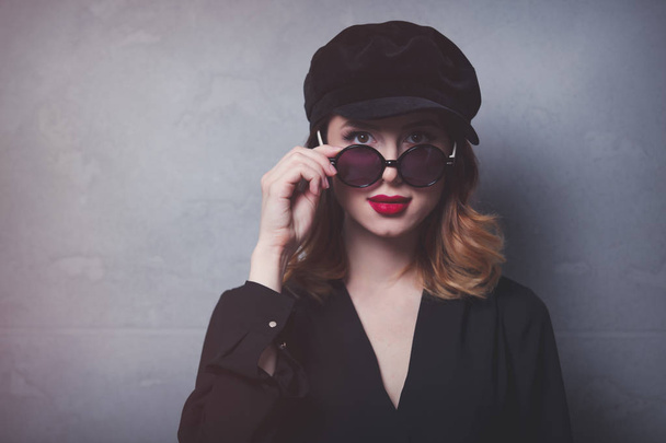 redhead girl in black hat - Valokuva, kuva