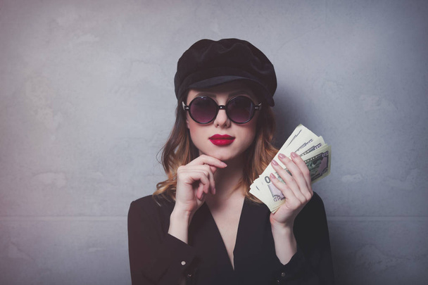 girl in black hat with money  - Photo, image