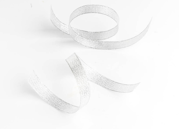 silver ribbon bow  on white isolated - Valokuva, kuva