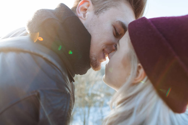 Young hipster couple kissing in city - Photo, image