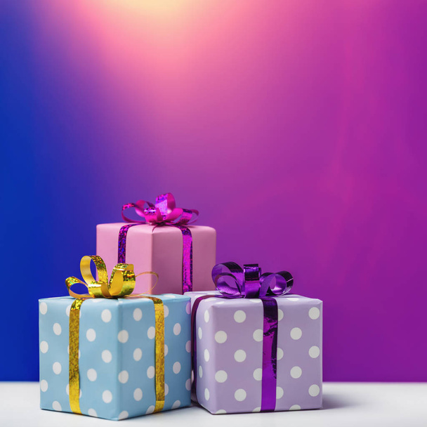 Boxes with gifts on festive background. - Фото, зображення