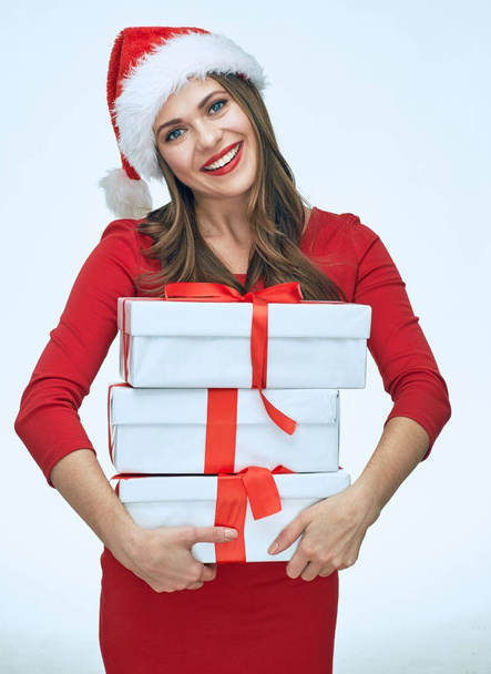 businesswoman in santa hat holding boxes - Foto, Bild