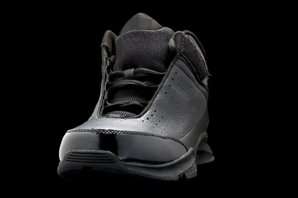 Sport shoes on black macro - Photo, Image