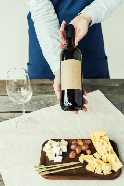 sommelier showing bottle of wine - Photo, Image