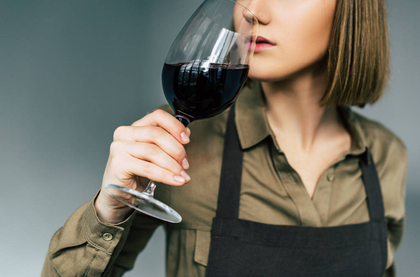 sommelier examining red wine  - Photo, Image